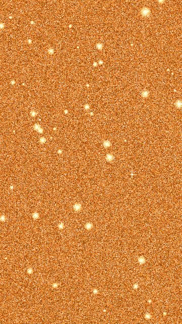 Orange glitter background, fine glitter